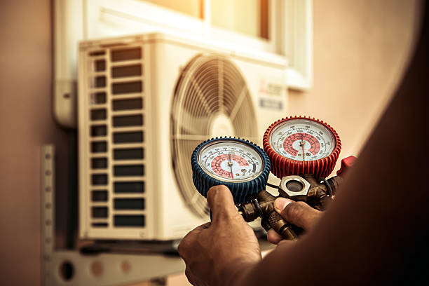 Professional Air Conditioning Service technician working in Greer, SC